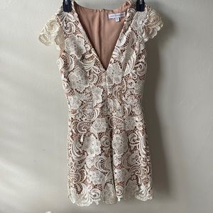 White lacy romper I’m size XS